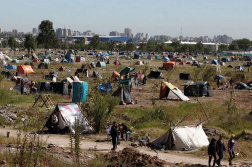 Piden quitarle los planes sociales a quienes tomen tierras